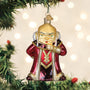 D&D Dungeon Master Decorative Christmas ornament of a character in a red outfit with gold accents on a Christmas tree.