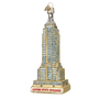 Glass ornament of the Empire State Building on a white background