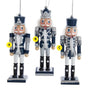Blue and silver nutcracker ornaments with glittered trim, jeweled accents, white hair, and three distinct regal styles shown together.