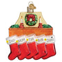 Decorative Christmas ornament with red stockings labeled on a white background.