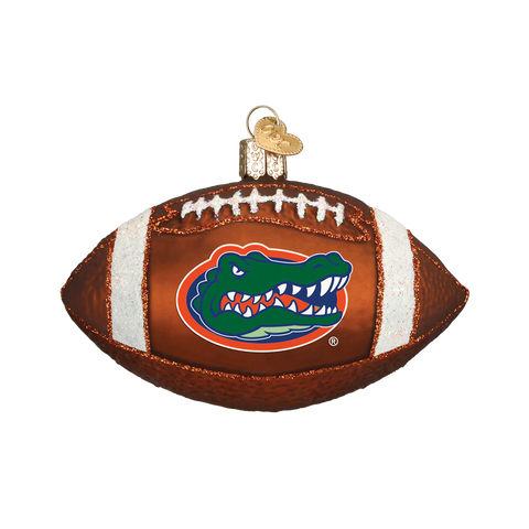 Glass football ornament with Florida Gators logo on a white background