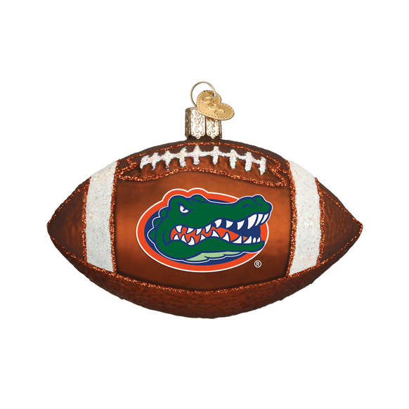 Glass football ornament with Florida Gators logo on a white background
