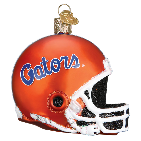 Glass football helmet ornament with 'Gators' text on a white background