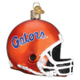 Glass football helmet ornament with 'Gators' text on a white background