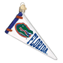 Glass ornament shaped like a Florida Gators pennant with logo on a white background