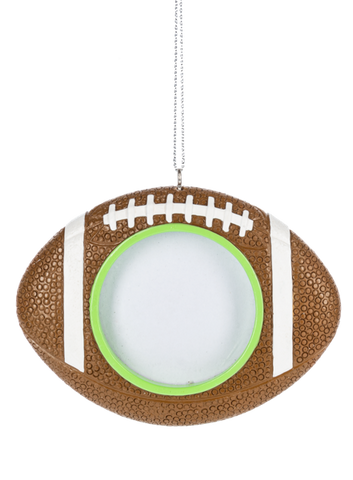 Football picture frame ornament shaped like a brown football with white laces, white stripes, and a circular center opening for a photo.