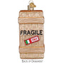 Decorative Christmas ornament shaped like a shipping box with 'FRAGILE' label and 'ITALY' flag.