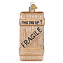 Decorative glass shipping crate ornament with 'This End Up' and 'Fragile' text on a white background
