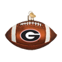 Glass football ornament with a Georgia logo on a white background