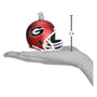 Red football helmet ornament with a Georgia logo on a hand to show size
