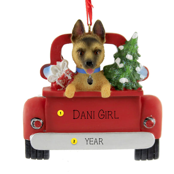 German Shepherd Dog ornament in a red truck with text on a white background