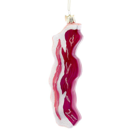 Glass bacon ornament shaped like a wavy strip of bacon with red and pink coloring, white fat detail, silver cap, and hanging loop.