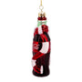 Decorative Coca-Cola bottle ornament with plaid scarf on a white background