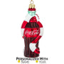 Coca-Cola bottle ornament with a scarf on a white background