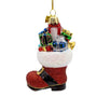 Glass Santa boot ornament filled with colorful presents, candy cane stripes, white glitter trim, and red glitter boot.
