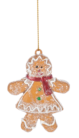 Glittered Gingerbread Girl ornament with icing details, a smiling face, and a layered cookie-style dress decorated with white red, and green accents.