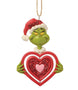 Front view of licensed Jim Shore Grinch Rotating Heart Ornament featuring the Grinch in a Santa hat holding a layered red heart.