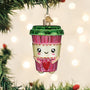 Christmas ornament shaped like a coffee cup with a green lid, pink sleeve, and red heart, hanging on a Christmas tree.