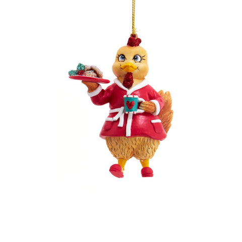 Hen ornament in a red robe-style pajama outfit, holding a tray of cookies and a blue mug with a heart.