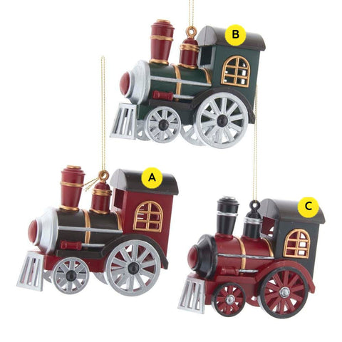Set of three Holiday Express Train Ornament variants shaped like vintage locomotives in green and red colorways with metallic wheel details and gold hanging cords.