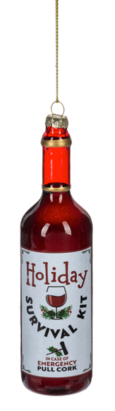 Wine bottle ornament with red wine and a label that reads “Holiday Survival Kit” with a wine glass graphic.
