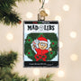 Mad Libs Christmas ornament hanging on a tree with lights in the background