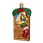Decorative Christmas ornament with a horse in a stable, with a red stacking hanging on the stall. 