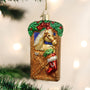 Decorative Christmas ornament with a horse design on a tree.