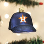 Navy blue baseball cap ornament with a Houston Astros logo on a Christmas tree.