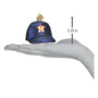 Glass ornament shaped like a baseball cap with a Houston Astros logo, held in a hand to show size.