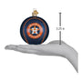 Houston Astros baseball ornament on a hand with measurement indicator