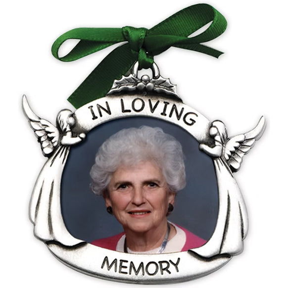 In Loving Memory photo ornament with silver angel frame, green ribbon, and memorial photo opening