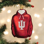 Red hoodie ornament with a white 'IU' logo hanging on a Christmas tree.