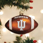 Football ornament with Indiana 'IU' logo on a Christmas tree