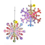 Pastel Aurora Snowflake variant of an iridescent jeweled snowflake ornament with pink, green, blue, and purple faceted details.

Rainbow Aurora Snowflake variant of an iridescent jeweled snowflake ornament with bright rainbow-colored faceted details.