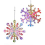 Two colorful crystal snowflake ornaments on a white background