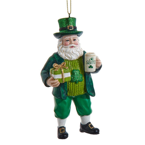 Santa ornament in green and white holding a Luck of the Irish sign and a pot of gold with shamrock accents.