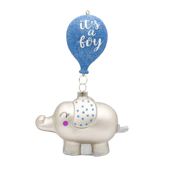 Blue and silver baby elephant ornament with a glittered blue balloon reading “it’s a boy,” shown from the front hanging view.