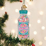 Decorative ornament shaped like a bottle labeled 'Sprinkles' on a Christmas tree.