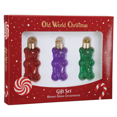 Set of three gummy bear-shaped ornaments in red, purple, and green packaging with 'Old World Christmas' branding.