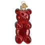 Red gummy bear ornament on a white background