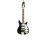 John Lennon black and white electric guitar ornament with contrasting body and metallic details