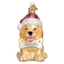 Glass ornament of a dog wearing a Santa hat with 'Snickers' on a white background