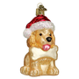Glass ornament of a dog wearing a Santa hat on a white background