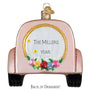 Decorative ornament shaped like a pink car for wedding can be personalized a white background.