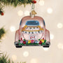Decorative ornament shaped like a pink truck with 'Just Married' and 'Love' text, hanging on a Christmas tree.