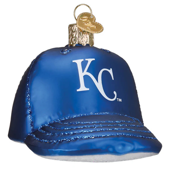 Blue baseball cap ornament with 'KC' logo on a white background