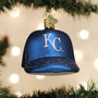 Blue Baseball Cap ornament with 'KC' logo on a Christmas tree.