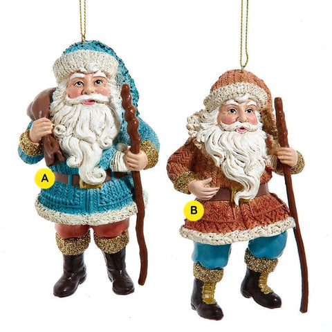 Woodland Santa ornaments with textured knit-look coats, long white beards, walking staffs, and rustic old-world styling in blue and rust color options.