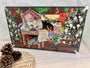 Mini Glass Ornament Advent Calendar in a decorative box featuring Santa, an elf, and numbered doors for each day of Advent.